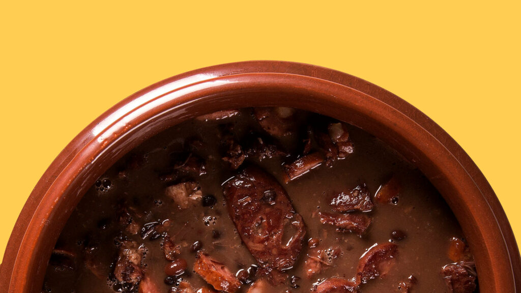 Rustic Feijoada Close-Up: Traditional Brazilian Stew Wallpaper
