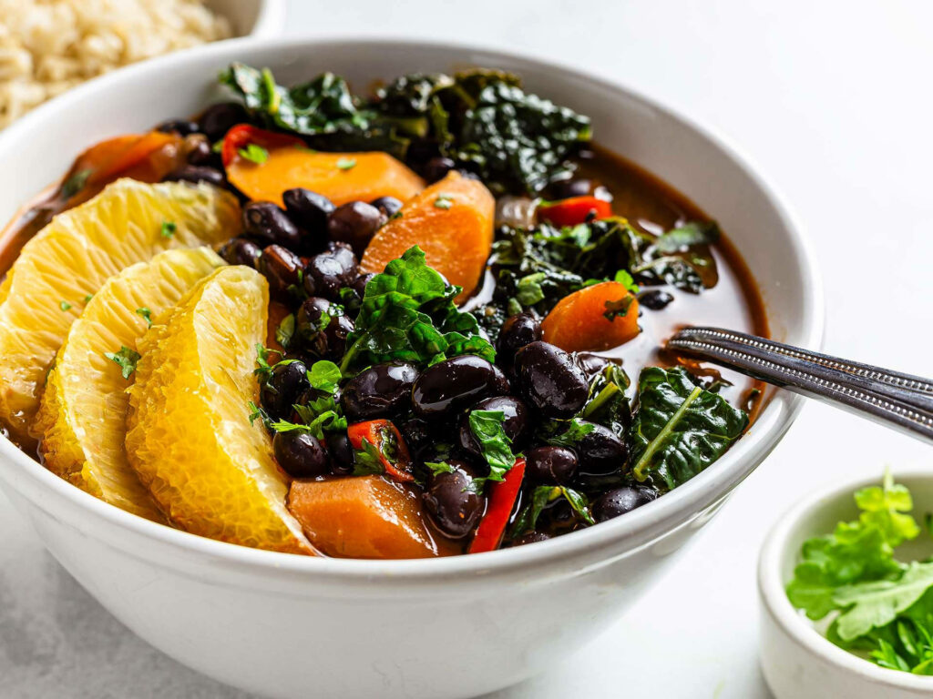 Vibrant Feijoada: Colorful Black Bean Stew Wallpaper Background