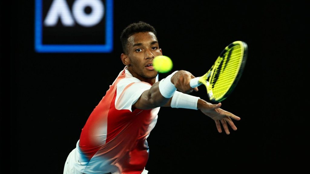 Tennis star Félix Auger-Aliassime mid backhand Australian Open dynamic sports wallpaper background
