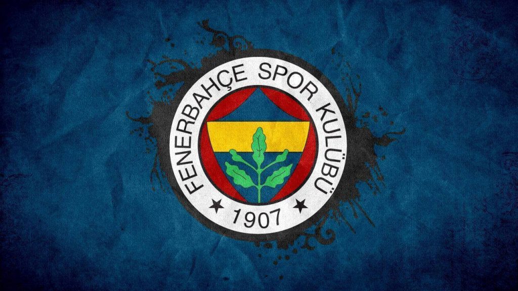 Fenerbahçe SK emblem on textured deep blue paper wallpaper for passionate Turkish club fans