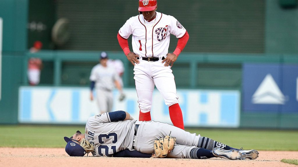 Fernando Tatís Jr. injured on field under Washington Nationals player tense MLB moment wallpaper