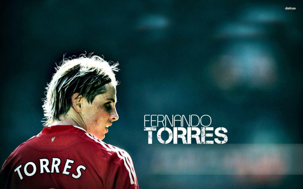Fernando Torres in iconic red jersey intense focused expression football star wallpaper background