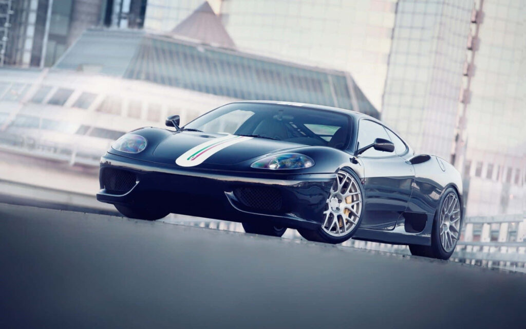 Unleashing the Thrills: Capturing the Exhilarating Power and Elegance of the Ferrari 360 Modena on a Scenic Journey Wallpaper