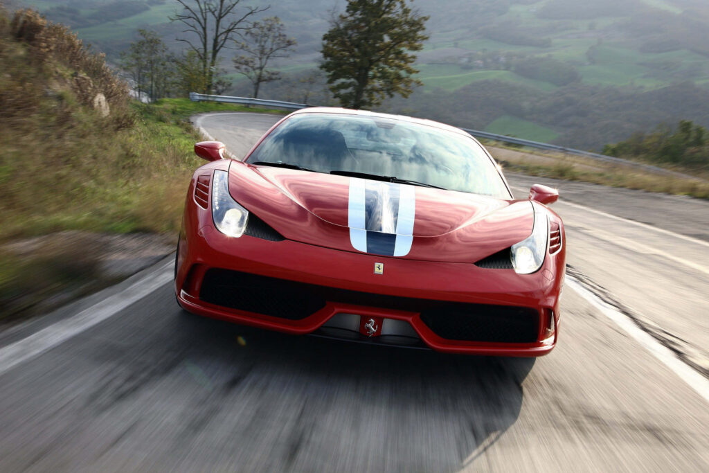 Rev Up Your Senses: Unleashing the Thrills of the Ferrari 458 Speciale on a Breathtaking Canvas Wallpaper