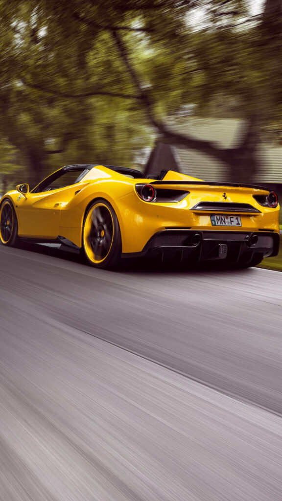 Roaring Sunshine: Capturing the Beauty of a Yellow 488 Spider Ferrari Wallpaper