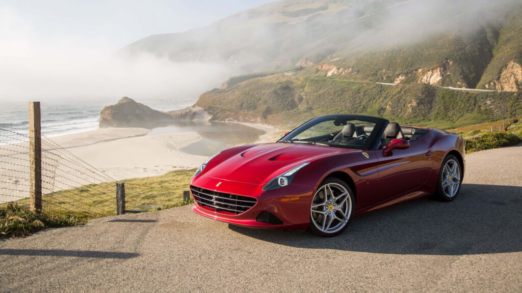 Unveiling the Unparalleled Opulence: Witness the Majesty of a Ferrari 4K in High Definition. Immerse Yourself in the Allure of Exquisite Luxury and Unbridled Power. Prepare for a Journey of Seamless Performance and Captivating Aesthetics with this Mesmerizing Backdrop. Wallpaper