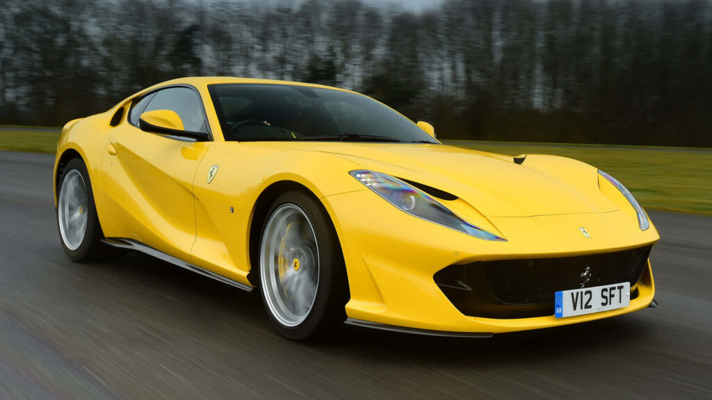 Unleash your inner thrill-seeker with the awe-inspiring Ferrari 812 Superfast: HD wallpaper showcasing pure adrenaline and unrivaled power