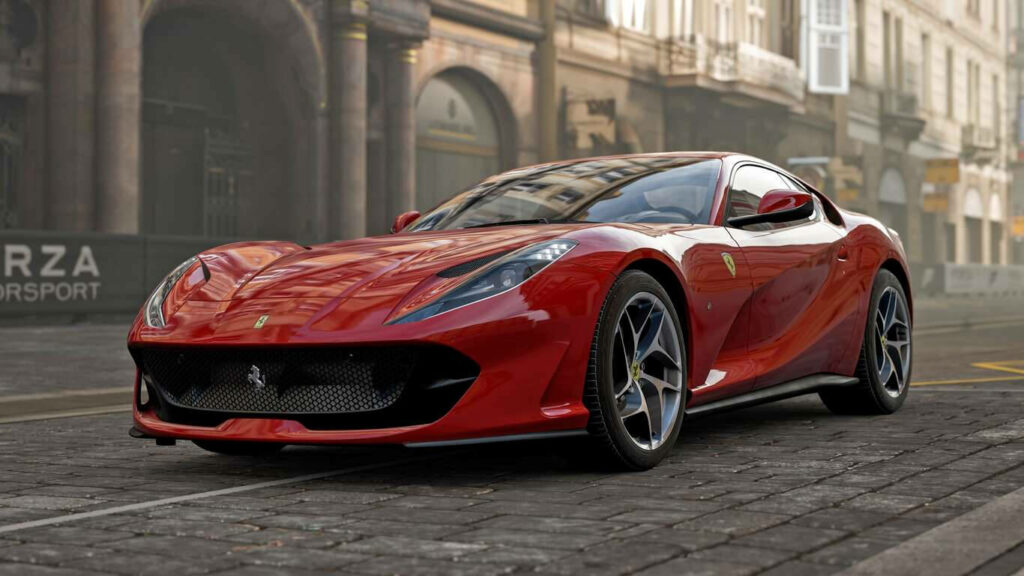 Ferrari 812 Superfast red luxury sports car on cobblestone street with elegant buildings background Wallpaper