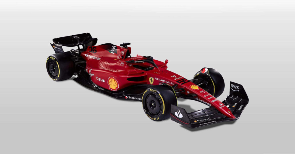 The Magnificent Ferrari F1-75: A Striking Profile against a Blank Canvas Wallpaper