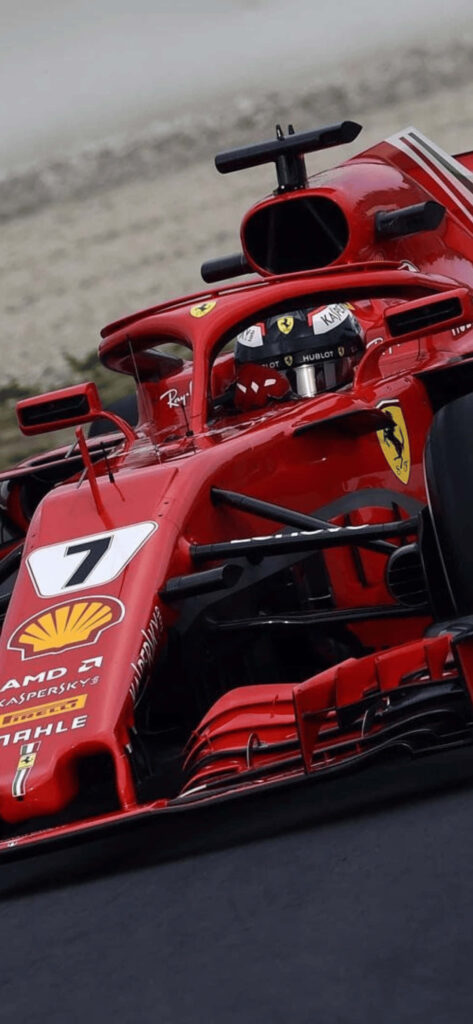 Speeding Towards Victory: Ferrari F1 Racer Embraces the Fierce F1 2018 Spirit Wallpaper