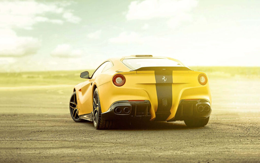 Ferrari F12 Berlinetta: Exquisite Elegance and Exhilarating Speed Unleashed on the Open Road Wallpaper