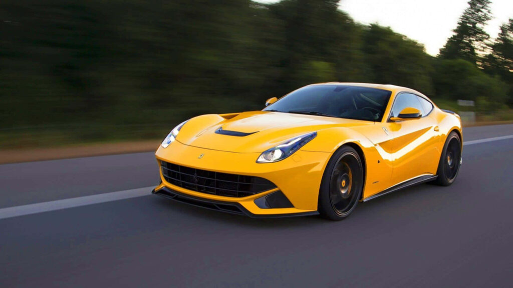 Unveiling Ferocious Elegance: Exploring the Breathtaking Magnificence of the Ferrari F12 Berlinetta Wallpaper