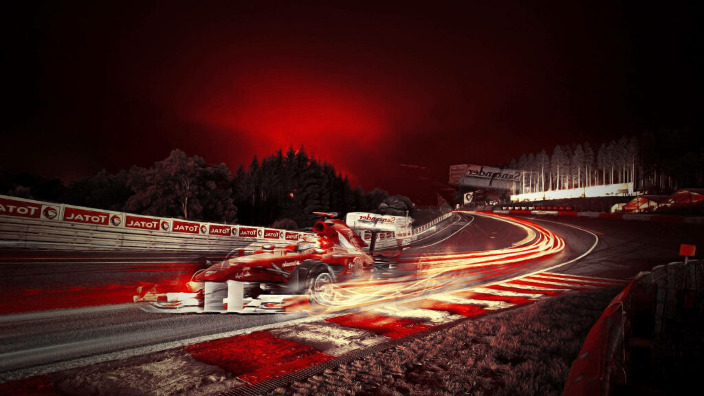 Ferrari F1 Dominating the Track with Blazing Speed: A Thrilling F1 Background Shot Wallpaper