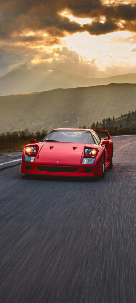 Sunset Drive: Mesmerizing Ferrari F40 Roaming the Dreamy Horizon Wallpaper