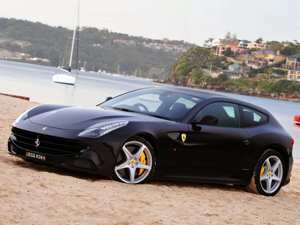 Unleashing the Unmatched Power and Opulent Grandeur: The Alluring Ferrari FF Amidst a Captivating Setting Wallpaper