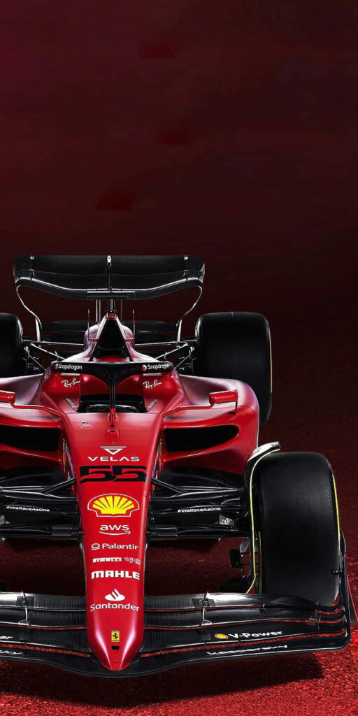 Blazing through the Circuit: An Exquisite Ferrari Racer, Radiating Power and Precision Wallpaper