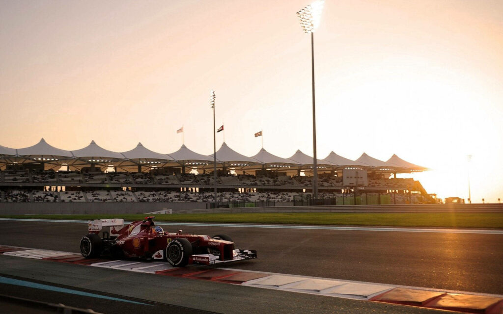 Ferrari's Swift Supremacy: Unleashing the Power and Speed of a Formula One Race Car Wallpaper