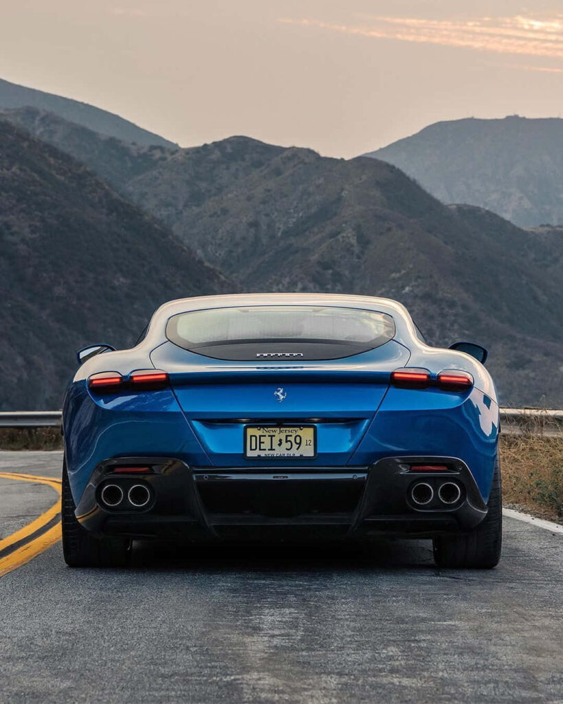 Dive into the Realm of Elegance and Dominance with the Ferrari Roma: A Captivating Masterpiece in 1080x1350 Wallpaper