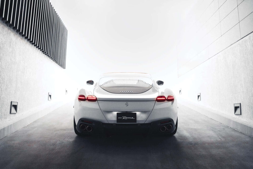 Cruising in Excellence: Unveiling the Striking Blue Ferrari Roma - A Masterpiece of Power, Elegance, and Adventure Wallpaper