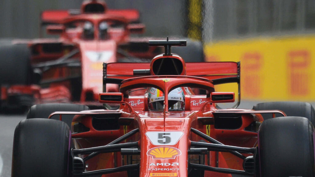 Roaring Rivalry: Ferrari SF71H Dominance Captured in F1 2018 Spectacle! Wallpaper