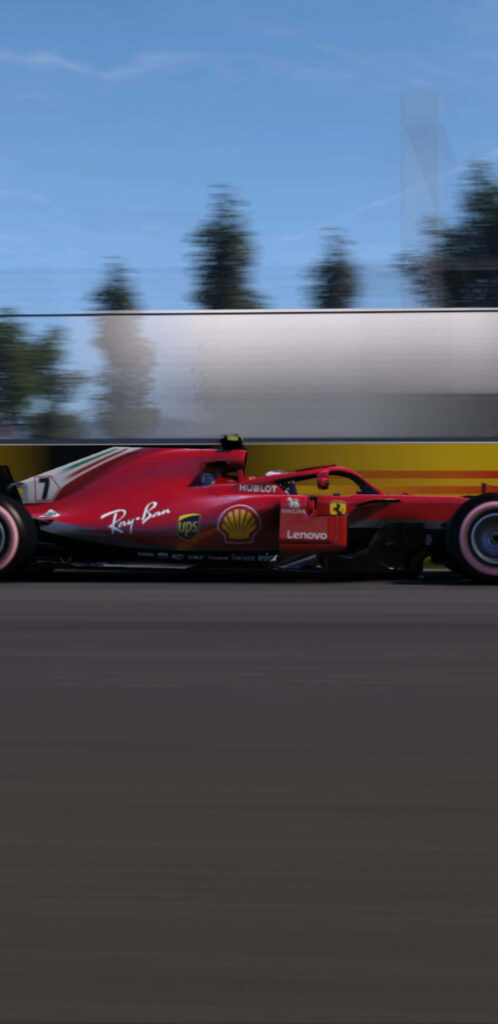 Ferrari's SF71H F1 Racing Machine: Conquering the 2018 FIA Formula One World Championship amidst a Breathtaking Backdrop Wallpaper