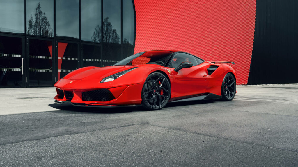 Iconic Italian Elegance: A Captivating Snapshot of a Ferrari Sports Car against a Stunning Tropical Backdrop Wallpaper