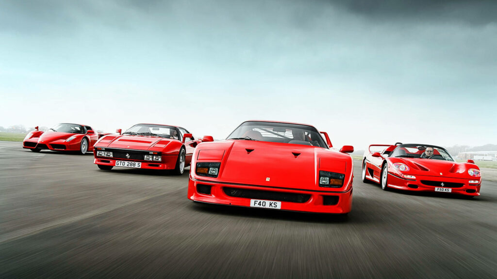 Legends Unleashed: Spectacular Ferrari Quartet Embarks on an Open Road Journey - Breathtaking High Definition Wallpaper