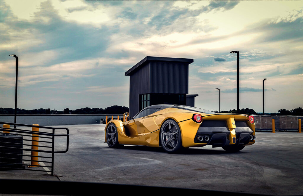 Experiencing the Thrill and Power: Embark on a Stylish Ferrari Adventure! Wallpaper