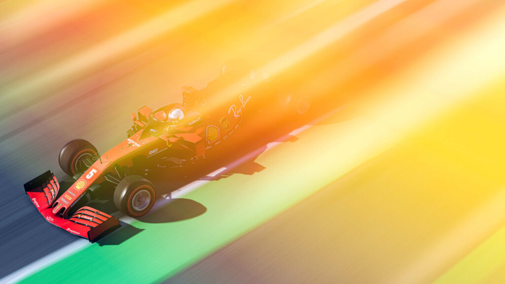 The Roaring Ruby: Ferrari Dominates the Twists and Turns of the Circuit Wallpaper