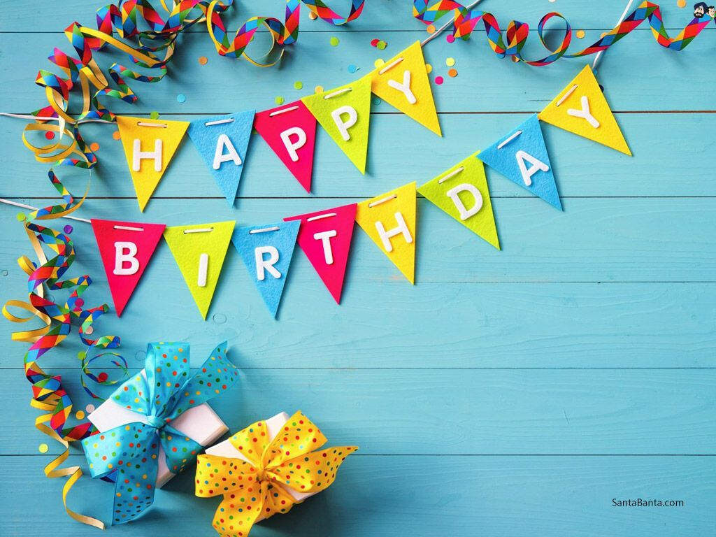 Festive Birthday Wallpaper with Colorful Pennants on Blue Background