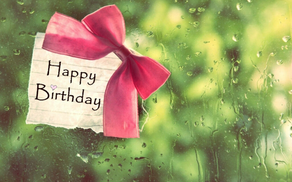 Festive Happy Birthday Wallpaper with Pink Ribbon & Green Background