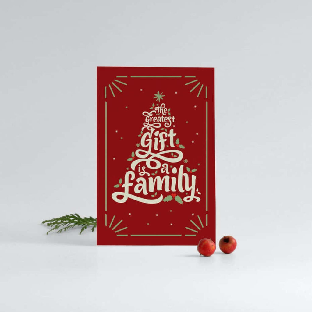 Festive Christmas Card with Heartwarming Family Message & Holly Background Wallpaper