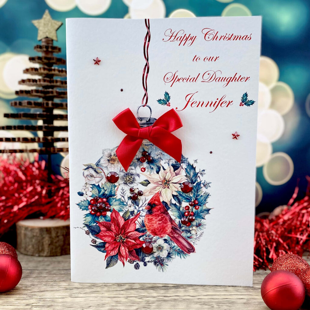 Festive Christmas Card with Cardinal, Poinsettias, and Sparkling Lights Wallpaper