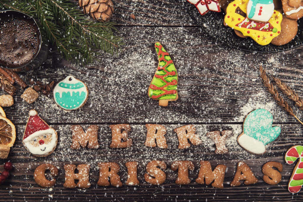 Festive Christmas Cookie Wallpaper on Rustic Wood Background
