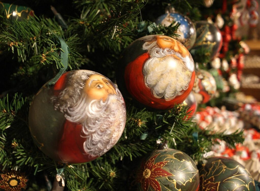 Festive Christmas Wallpaper with Ornaments & Lush Green Tree