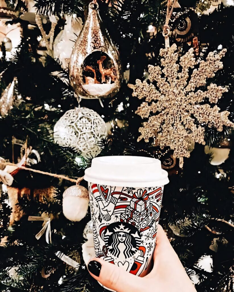Festive Christmas Tree & Coffee: Inspiring Holiday Joy Scene Wallpaper