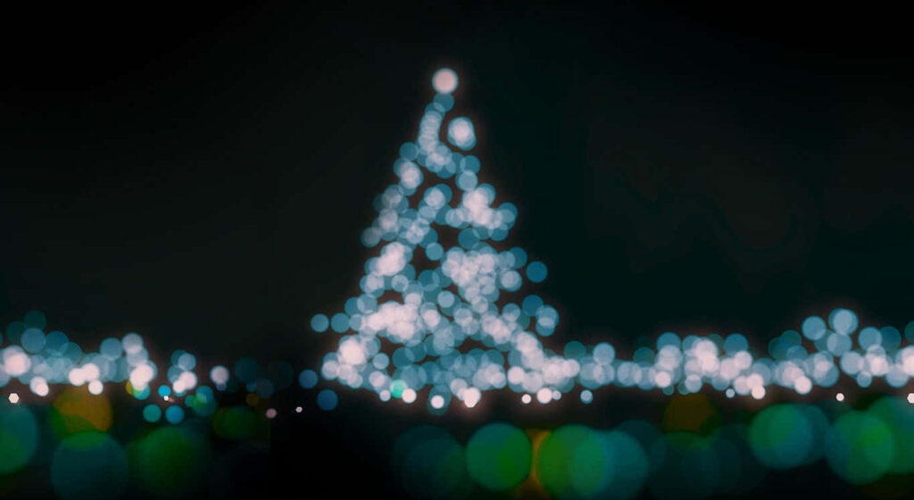 Festive Christmas Tree Lights Wallpaper: Warm Holiday Background