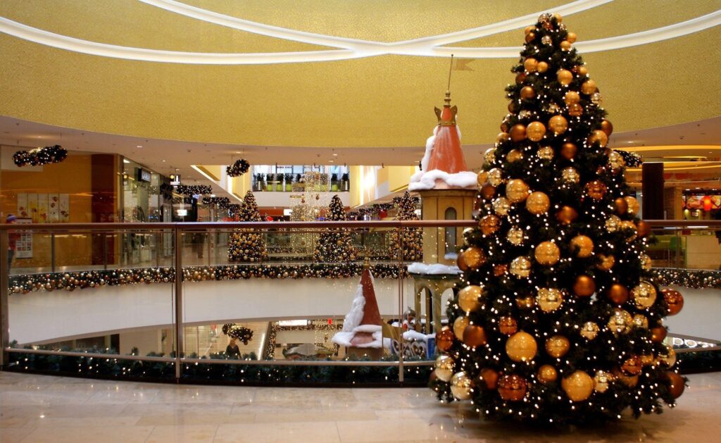 Festive Christmas Tree Wallpaper: Shopping Center Holiday Cheer