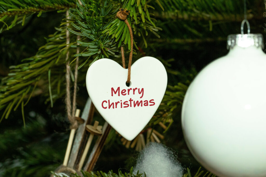 Close-Up Christmas Tree Wallpaper: Festive Holiday Decor Background