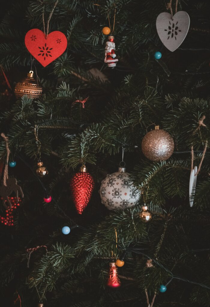 Festive Christmas Tree Wallpaper: Colorful Ornaments & Santa Decor