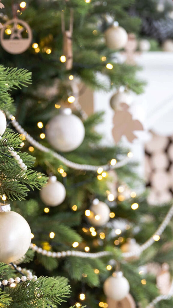 Elegant Holiday Wallpaper: Christmas Tree & Cozy Fireplace Scene