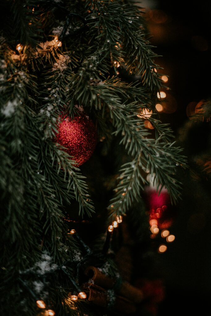 Close-Up Christmas Tree Wallpaper with Festive Decorations & Lights
