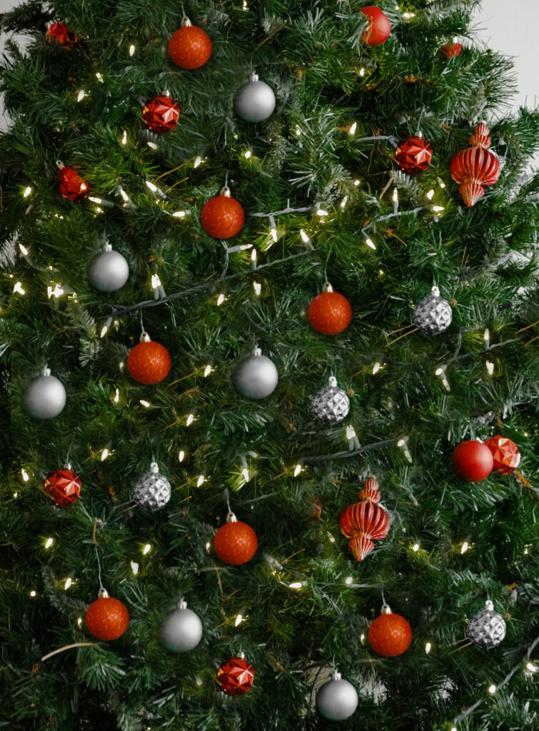 Festive Christmas Tree Wallpaper: Sparkling Holiday Spirit Background