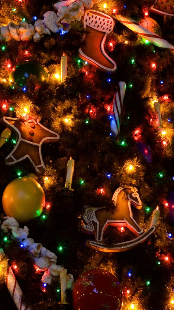 Festive Christmas Phone Background with Decorated Tree & Ornaments Wallpaper