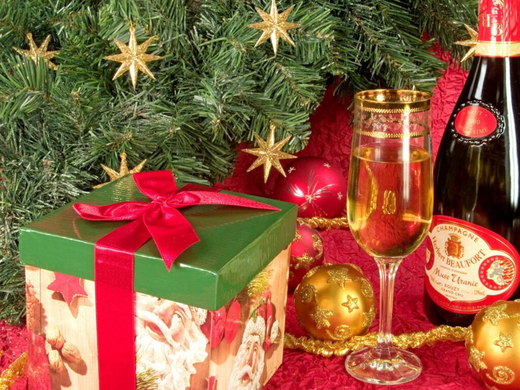 Festive Christmas & New Year Wallpaper with Gift Box & Champagne