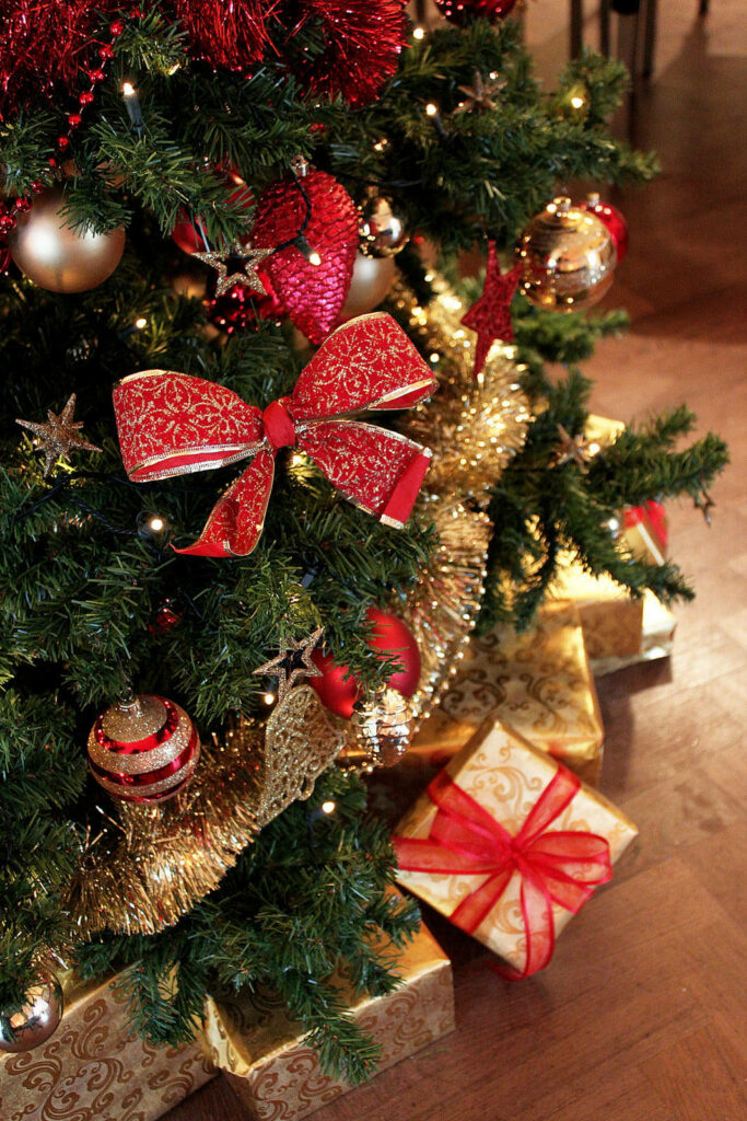 Festive Christmas Wallpaper: Gifts & Decorated Tree Scene