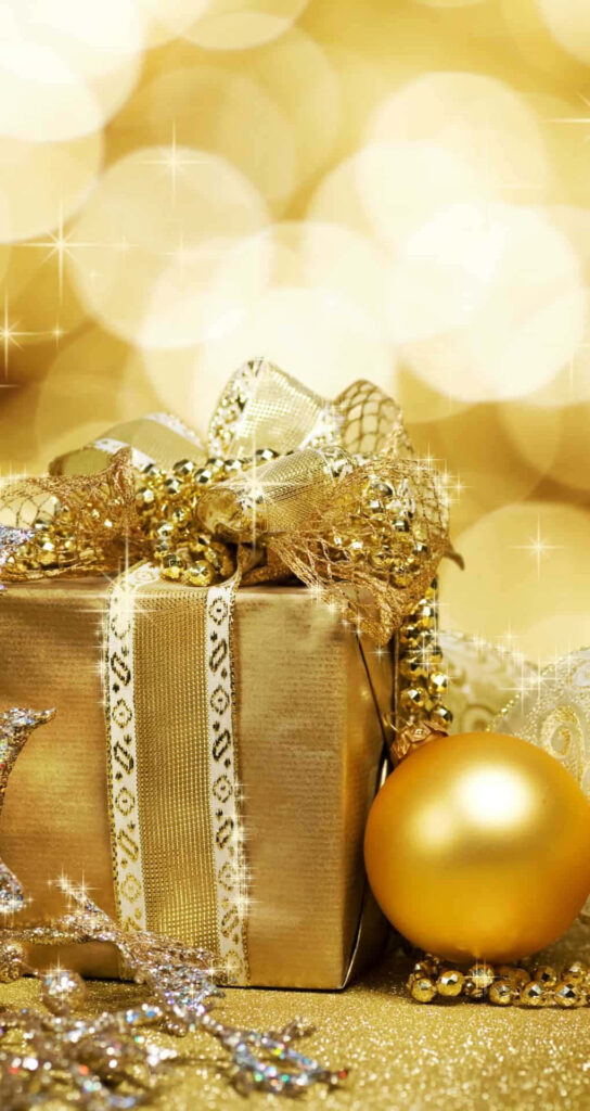 Festive Wallpaper: Golden Gift Box & Cozy Christmas Lights