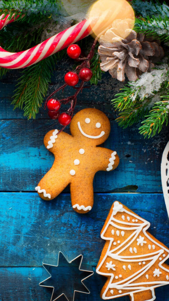 Cheerful Christmas Wallpaper: Gingerbread Person & Decorated Tree