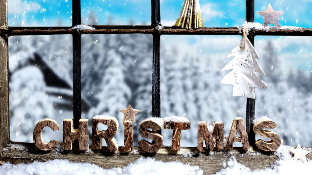 Festive Christmas Wallpaper: Snowy Letters & Frosty Window Scene