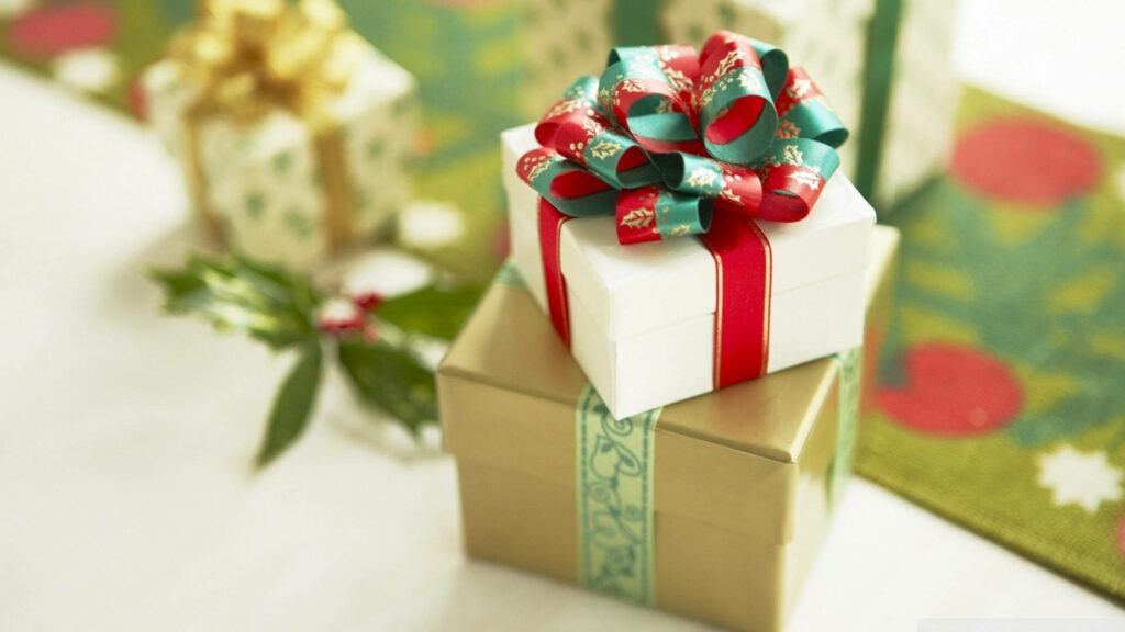 Festive Christmas Wallpaper with Elegant Wrapped Presents and Greenery